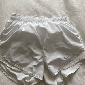 White Nike shorts